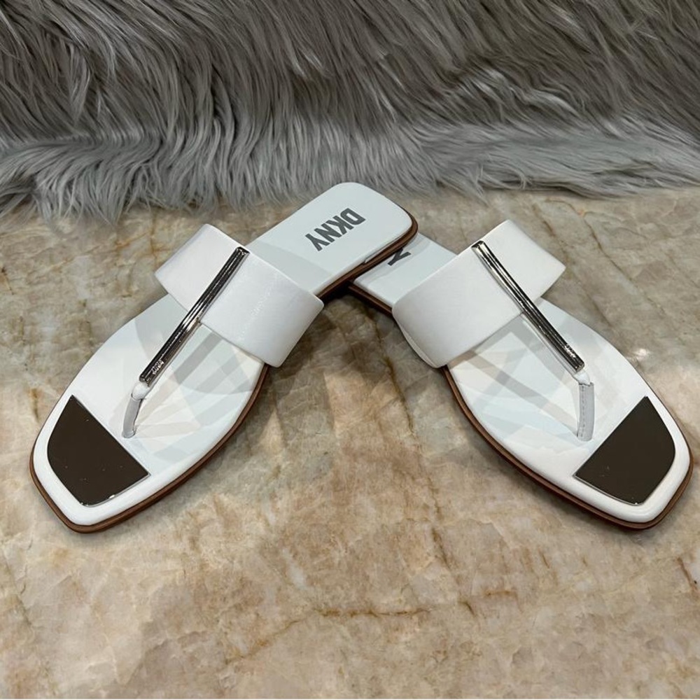 DKNY women’s Deja Slip-On Embellished Thong Sandals.
